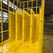 Steel structure fabrication with priming and painting