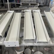 Industrial I-column priming for corrosion protection.