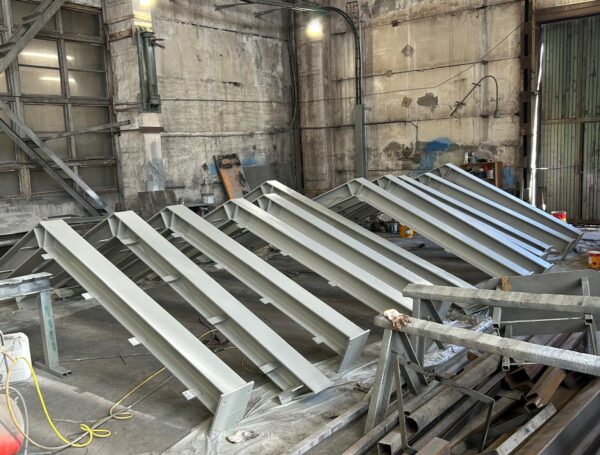 Steel roof truss fabrication
