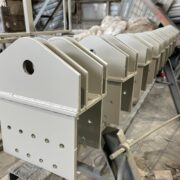 Production of metal brackets for industrial structures