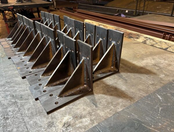 Production of steel corner brackets