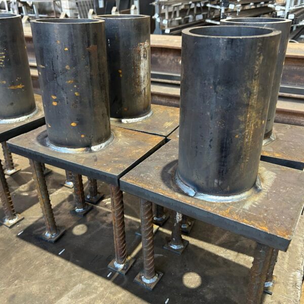 Atvērtā tipa ieliekamās detaļas